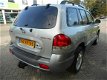 Hyundai Santa Fe - 2.4i-16V Elite 146pk Leder Schuifdak Trekhaak 2000kg - 1 - Thumbnail