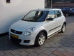 Suzuki Swift - 1.3 5dr bandit gt pakket 1e eigenaar - 1 - Thumbnail