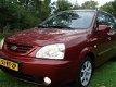 Kia Carens - 2.0 CVVT EX - 1 - Thumbnail