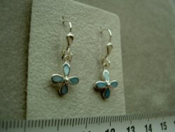 Zilveren bloem blauw hangertjes oorbellen kinderoorbellen