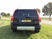 Volvo XC70 - 2.4 D5 Comfort Line TOP ONDERH XENON FRAAIE AUTOMAAT - 1 - Thumbnail