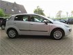 Fiat Punto Evo - 1.3 Punto M-JET MYLIFE | AIRCO | TREKHAAK | ISOFIX | INC. BOVAG GARANTIE - 1 - Thumbnail