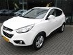 Hyundai ix35 - 1.6i GDI Dynamic, Half leer, Airco, Multi stuur - 1 - Thumbnail