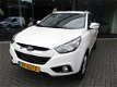 Hyundai ix35 - 1.6i GDI Dynamic, Half leer, Airco, Multi stuur - 1 - Thumbnail