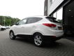 Hyundai ix35 - 1.6i GDI Dynamic, Half leer, Airco, Multi stuur - 1 - Thumbnail