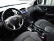 Hyundai ix35 - 1.6i GDI Dynamic, Half leer, Airco, Multi stuur - 1 - Thumbnail