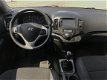 Hyundai i30 CW - 1.6I I-MOTION | Achteruitrijcamera | Climate Control | Cruise Control | Navigatie | - 1 - Thumbnail