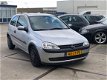 Opel Corsa - 1.2-16V Comfort*Stuurbkr*Elek.ramen*APK 10-2019 - 1 - Thumbnail