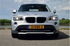 BMW X1 - 1.8d sDrive Executive RIJKLAAR PRIJS-GARANTIE Navigatie Leder Interieur Panoramadak Trekha