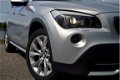 BMW X1 - 1.8d sDrive Executive RIJKLAAR PRIJS-GARANTIE Navigatie Leder Interieur Panoramadak Trekha - 1 - Thumbnail