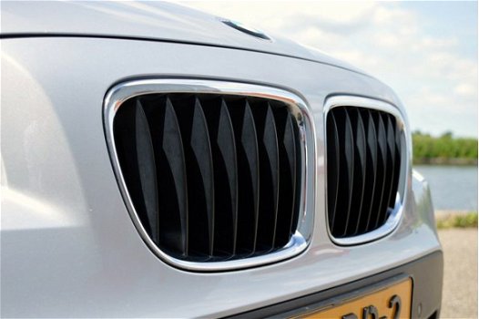 BMW X1 - 1.8d sDrive Executive RIJKLAAR PRIJS-GARANTIE Navigatie Leder Interieur Panoramadak Trekha - 1