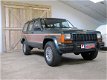 Jeep Cherokee - 8 mooie Cherokees op voorraad Nieuwjaarsshow U bent van harte welkom - 1 - Thumbnail