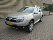 Dacia Duster - 1.6 PRESTIGE 2WD [ leer, airco, lmv ] - 1 - Thumbnail