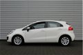 Kia Rio - 1.2 CVVT ComfortLine | Airco | Dealeronderhouden | 1e eigenaar | Bluetooth | Navi | - 1 - Thumbnail