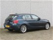 BMW 1-serie - 1-serie 116d EDE Business Dealer onderhouden. Historie en KM opvraagbaar bij dealer - 1 - Thumbnail