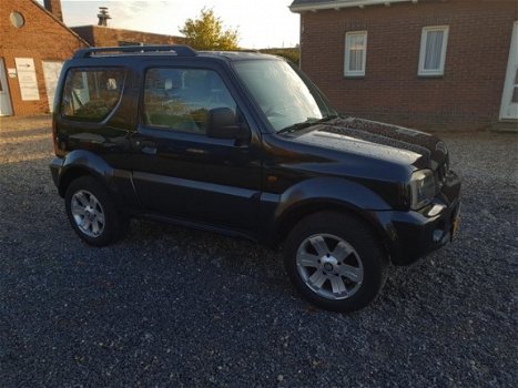 Suzuki Jimny - 1.3 4WD JX - 1