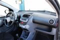 Toyota Aygo - AYGO 1.0-12V Access 5.DRS | AIRCO| NAP| GRIJS | - 1 - Thumbnail