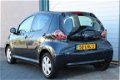 Toyota Aygo - AYGO 1.0-12V Access 5.DRS | AIRCO| NAP| GRIJS | - 1 - Thumbnail