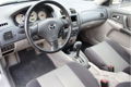 Mazda 323 - 323 1.6i Touring AUTOMAAT|ARICO|NAP|PDC|NEW APK| - 1 - Thumbnail