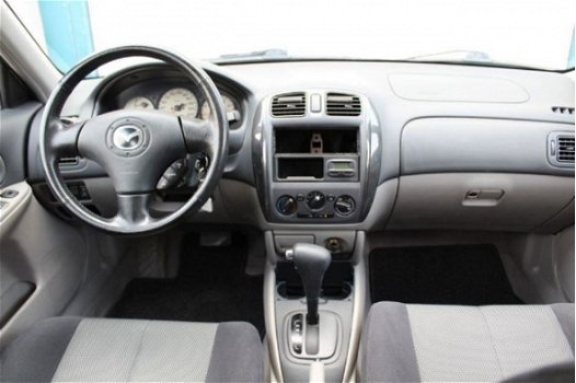 Mazda 323 - 323 1.6i Touring AUTOMAAT|ARICO|NAP|PDC|NEW APK| - 1