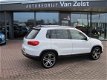 Volkswagen Tiguan - 2.0 TDI EDITION 4MOTION*NAVIGATIE*R-LINE VELGEN*AIRCO*LED*START/STOP - 1 - Thumbnail