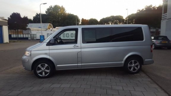 Volkswagen Transporter Kombi - 2.5 TDI 340 Trendl. CARAVELLE 9-PERSOONS - 1