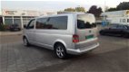 Volkswagen Transporter Kombi - 2.5 TDI 340 Trendl. CARAVELLE 9-PERSOONS - 1 - Thumbnail