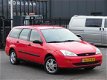 Ford Focus Wagon - 1.4-16V Ambiente - 1 - Thumbnail