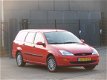 Ford Focus Wagon - 1.4-16V Ambiente - 1 - Thumbnail