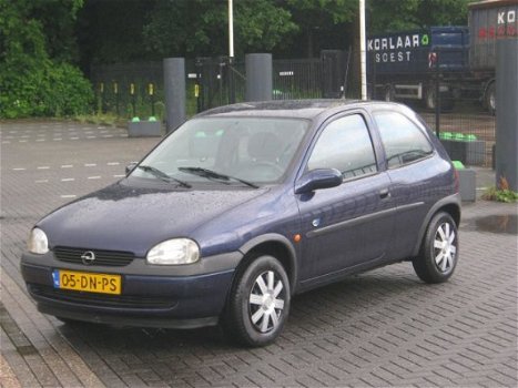 Opel Corsa - 1.2i-16V Strada - 1