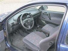 Opel Corsa - 1.2i-16V Strada