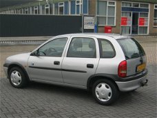 Opel Corsa - 1.2i-16V Strada