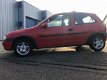 Opel Corsa - 1.4i-16V Sport - 1 - Thumbnail