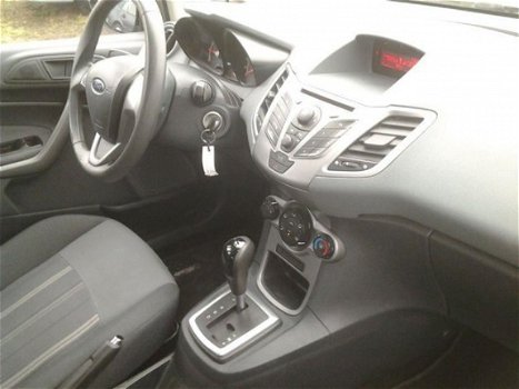 Ford Fiesta - 1.4 trend airco lmv radio cd. cv paarsmet fiesta 1.4 automaat 5.drs Zeer lux, s airco - 1