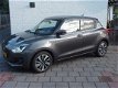 Suzuki Swift - 1.2 5drs stijl full options navigatie cruise enz - 1 - Thumbnail