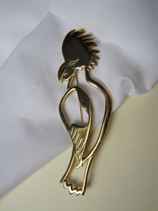 Broche goudkleurige papegaai/kaketoe vogel 12.3x4.0 cm - nr. 1