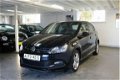 Volkswagen Polo - 1.2tsi r-line NAV CLIMA Dealer onderhouden - 1 - Thumbnail