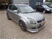 Suzuki Swift - 1.3 Comfort sport airco - 1 - Thumbnail