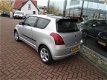 Suzuki Swift - 1.3 GLS , slechts 81.132km & DEALERONDERHOUDEN - 1 - Thumbnail