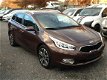 Kia cee'd Sportswagon - 1.6 GDI DynamicLine automaat 17 inch, zelf insturend, deels leder - 1 - Thumbnail