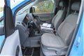 Volkswagen Caddy - 1.4i Benzine met Schuifdeur en Opties - 1 - Thumbnail