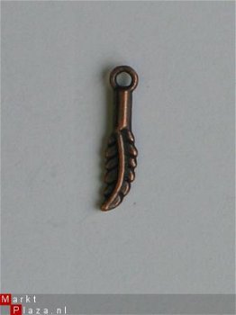 OPRUIMING: 10 metalen embellishments copper veer - 1