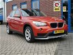 BMW X1 - 1.6d sDrive Business 116pk Airco PDC - 1 - Thumbnail