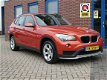 BMW X1 - 1.6d sDrive Business 116pk Airco PDC - 1 - Thumbnail