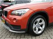 BMW X1 - 1.6d sDrive Business 116pk Airco PDC - 1 - Thumbnail