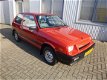 Suzuki Swift - 1.0 GL Automaat YOUNGTIMER - Apk tot 11-2020 - 1 - Thumbnail