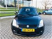 Suzuki Swift - 1.3 Comfort - 1 - Thumbnail