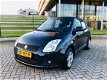 Suzuki Swift - 1.3 Comfort - 1 - Thumbnail