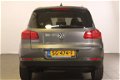 Volkswagen Tiguan - 1.4 TSI Sport&Style / navi / 2014 - 1 - Thumbnail