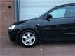 Opel Corsa - 1.2-16V Comfort - 1 - Thumbnail